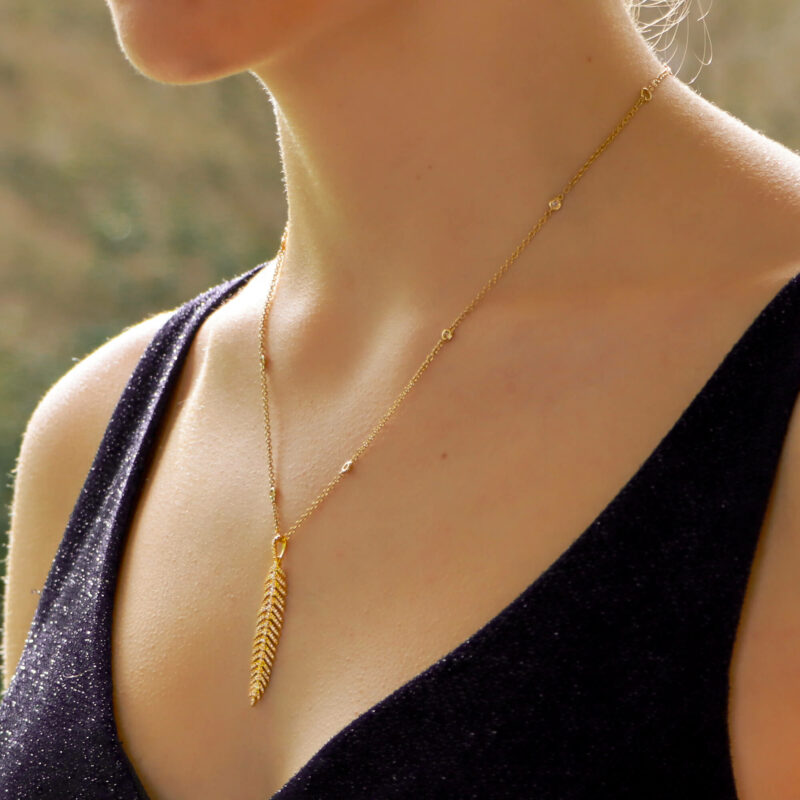 Contemporary Articulated Diamond Feather Necklace in Yellow Gold