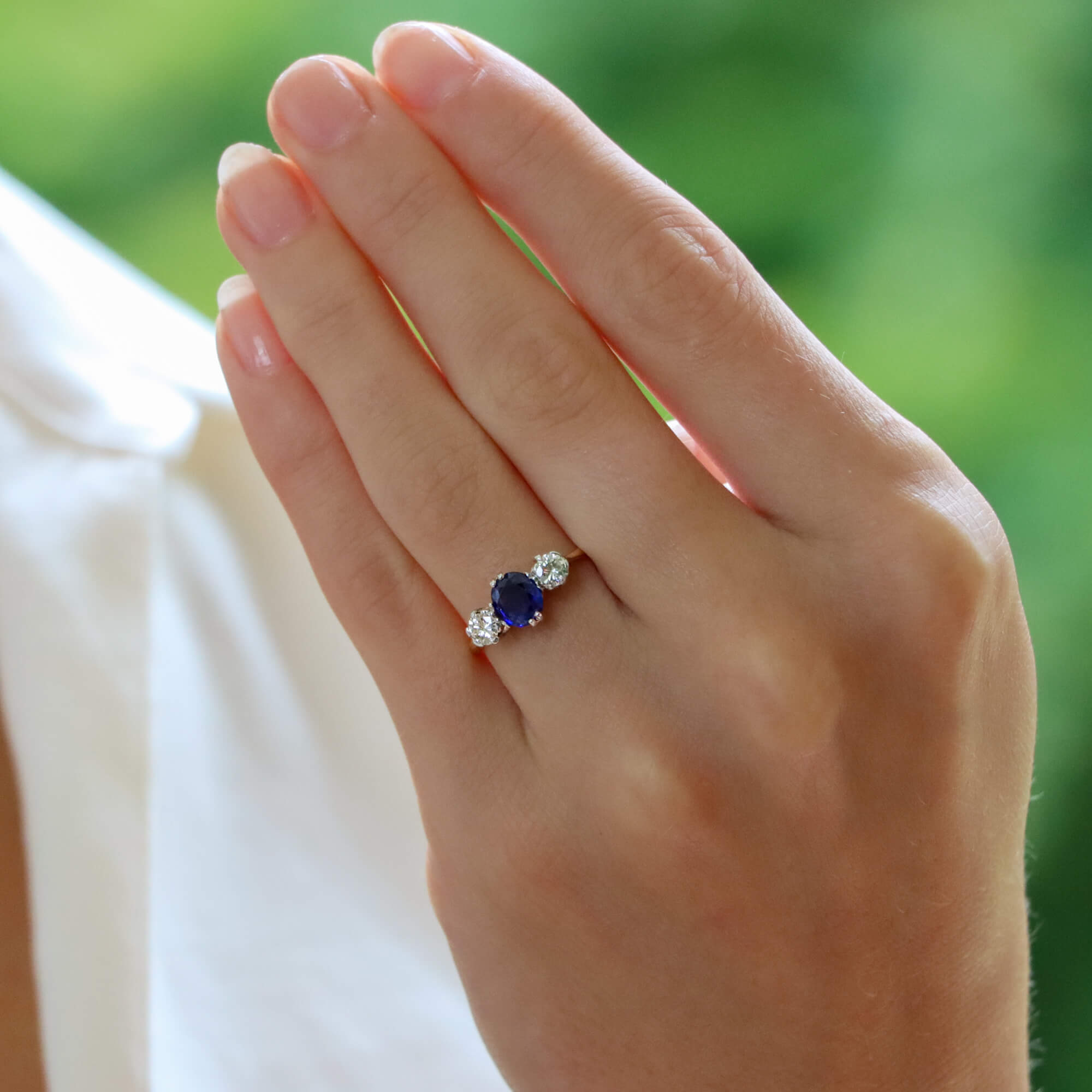 Sapphire and diamond clearance trilogy engagement rings
