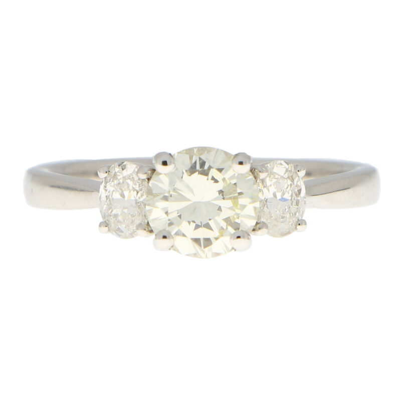 Pale Yellow Diamond Three Stone Ring