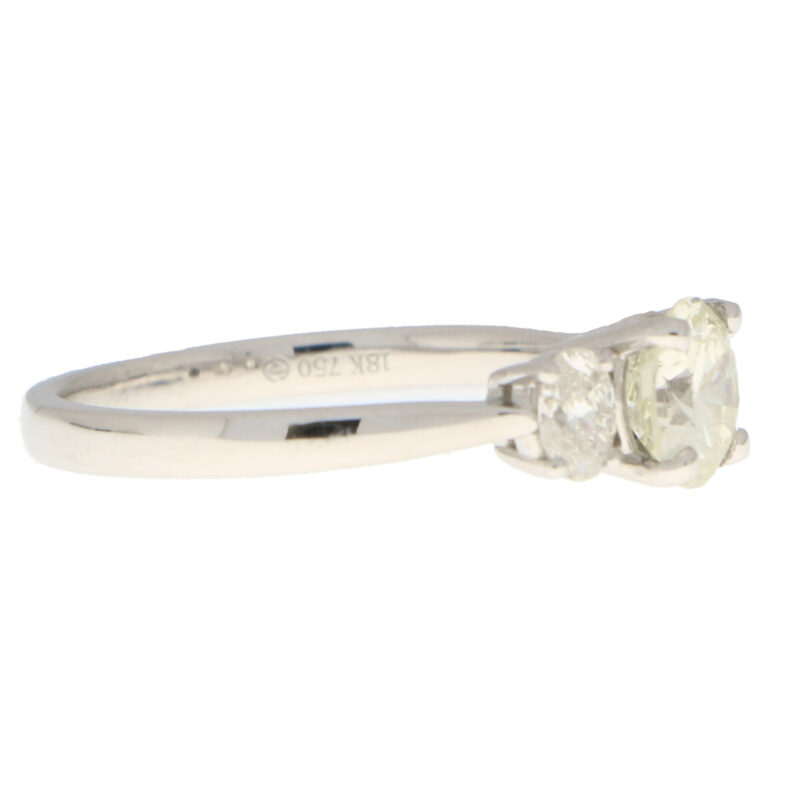 Pale Yellow Diamond Three Stone Ring