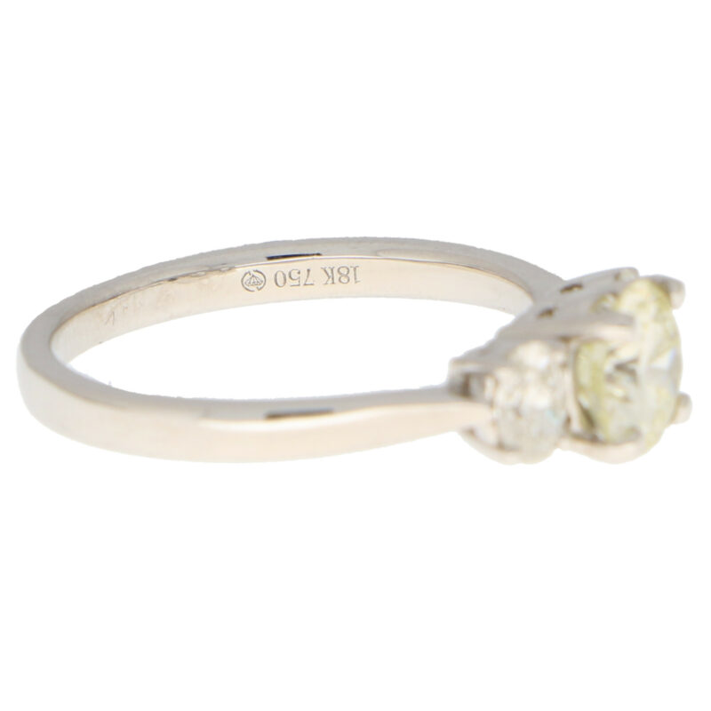 Pale Yellow Diamond Three Stone Ring