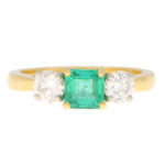 Emerald and Diamond Trilogy Engagement Ring in Yellow Gold