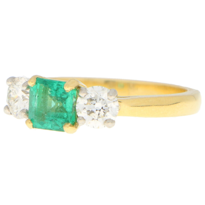 Emerald and Diamond Trilogy Engagement Ring in Yellow Gold