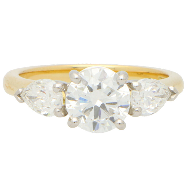 GIA Certified Round and Pear Cut Diamond Ring