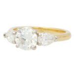 GIA Certified Round and Pear Cut Diamond Ring