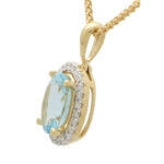 Aquamarine and Diamond Halo Pendant in Yellow Gold