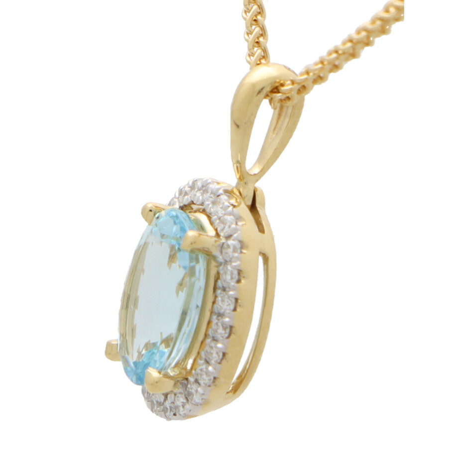 Aquamarine and Diamond Halo Pendant in Yellow Gold