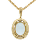 Aquamarine and Diamond Halo Pendant in Yellow Gold