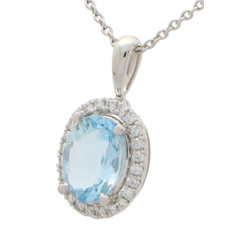 Aquamarine and Diamond Halo Pendant in White Gold