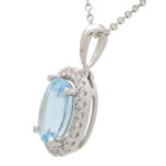 Aquamarine and Diamond Halo Pendant in White Gold