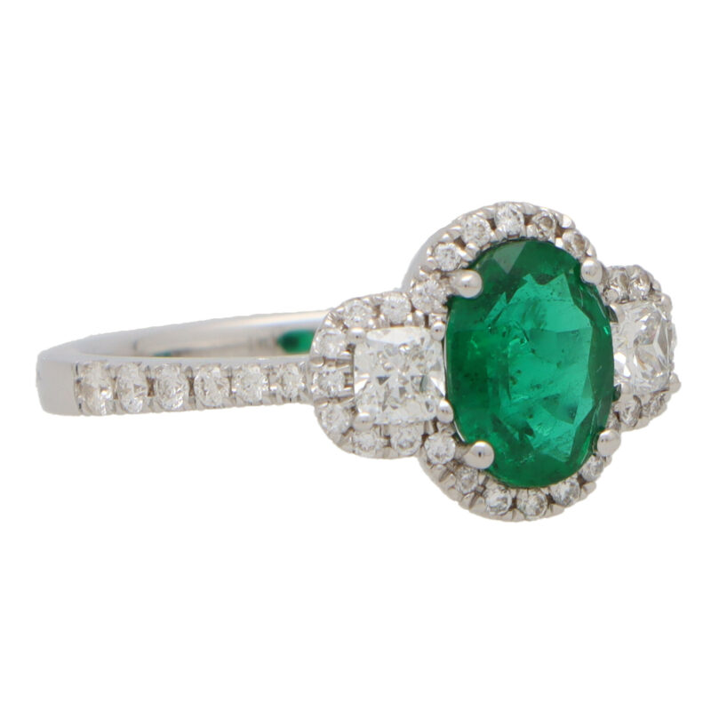 Emerald and Diamond Haloed Three Stone Ring