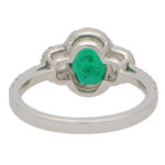 Emerald and Diamond Haloed Three Stone Ring