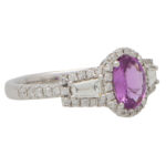 Pink Sapphire and Diamond Haloed Three Stone Ring