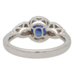 Sapphire and Diamond Haloed Three Stone Ring