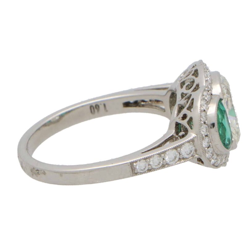 Art Deco Inspired Oval Diamond and Emerald Haloed Three Stone