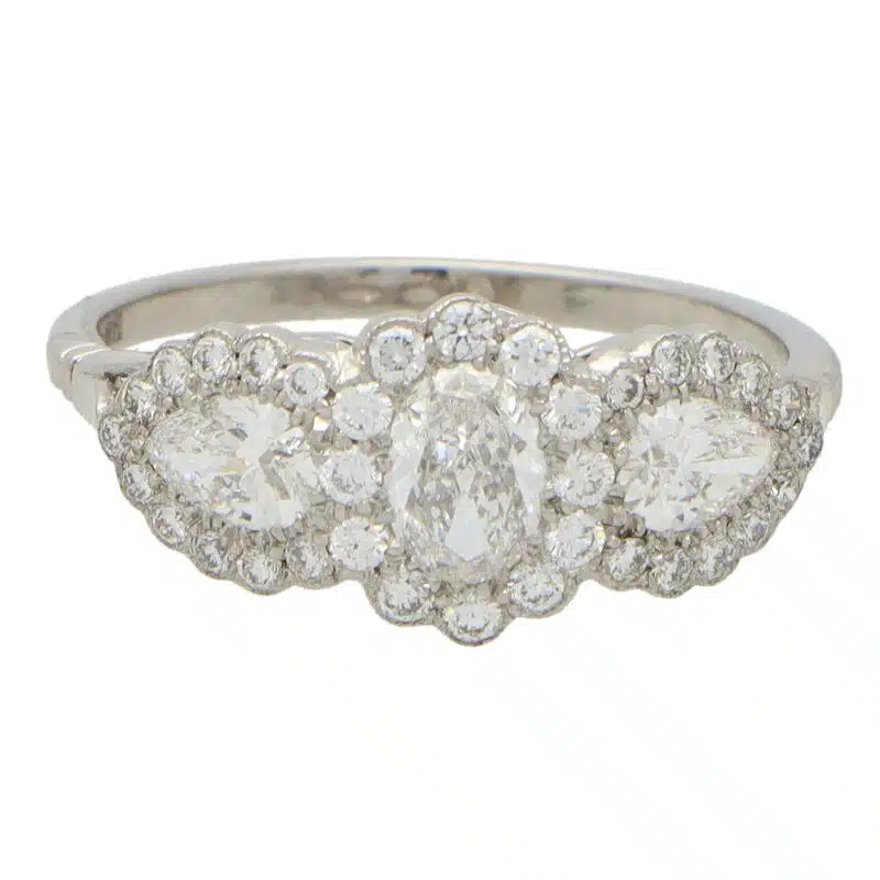 Oval Diamond Cluster Three Stone Ring