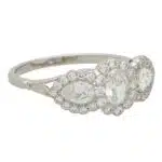 Oval Diamond Cluster Three Stone Ring