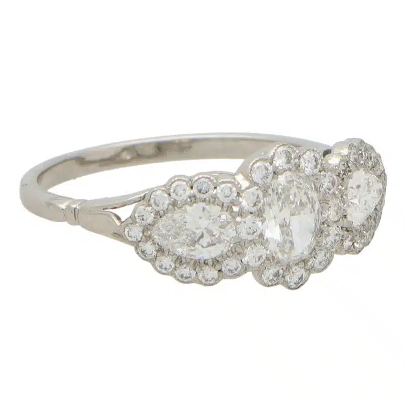 Oval Diamond Cluster Three Stone Ring