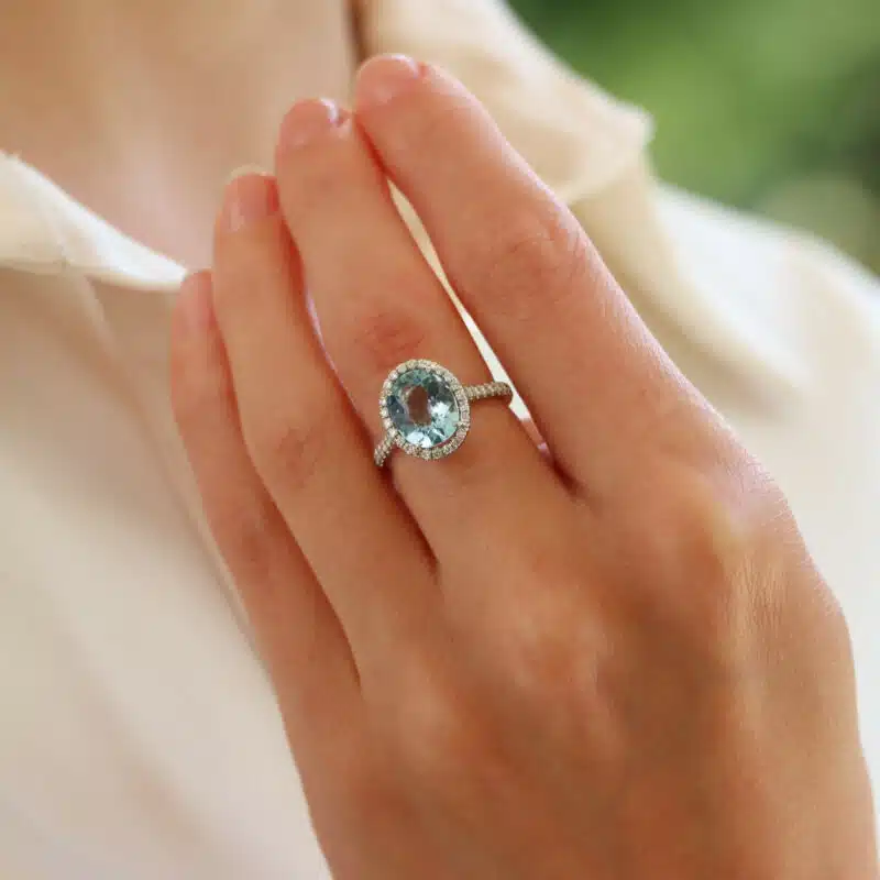 Aquamarine and Diamond Halo Ring in Platinum