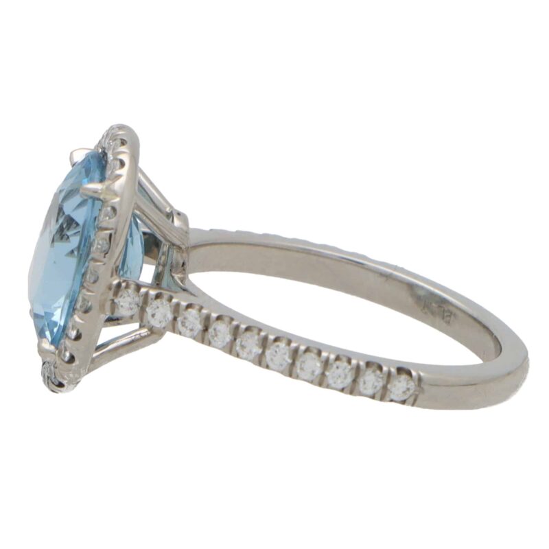 Aquamarine and Diamond Halo Ring in Platinum