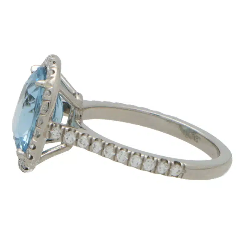 Aquamarine and Diamond Halo Ring in Platinum