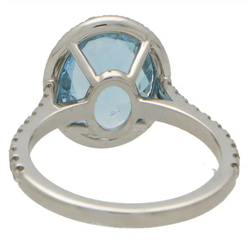 Aquamarine and Diamond Halo Ring in Platinum