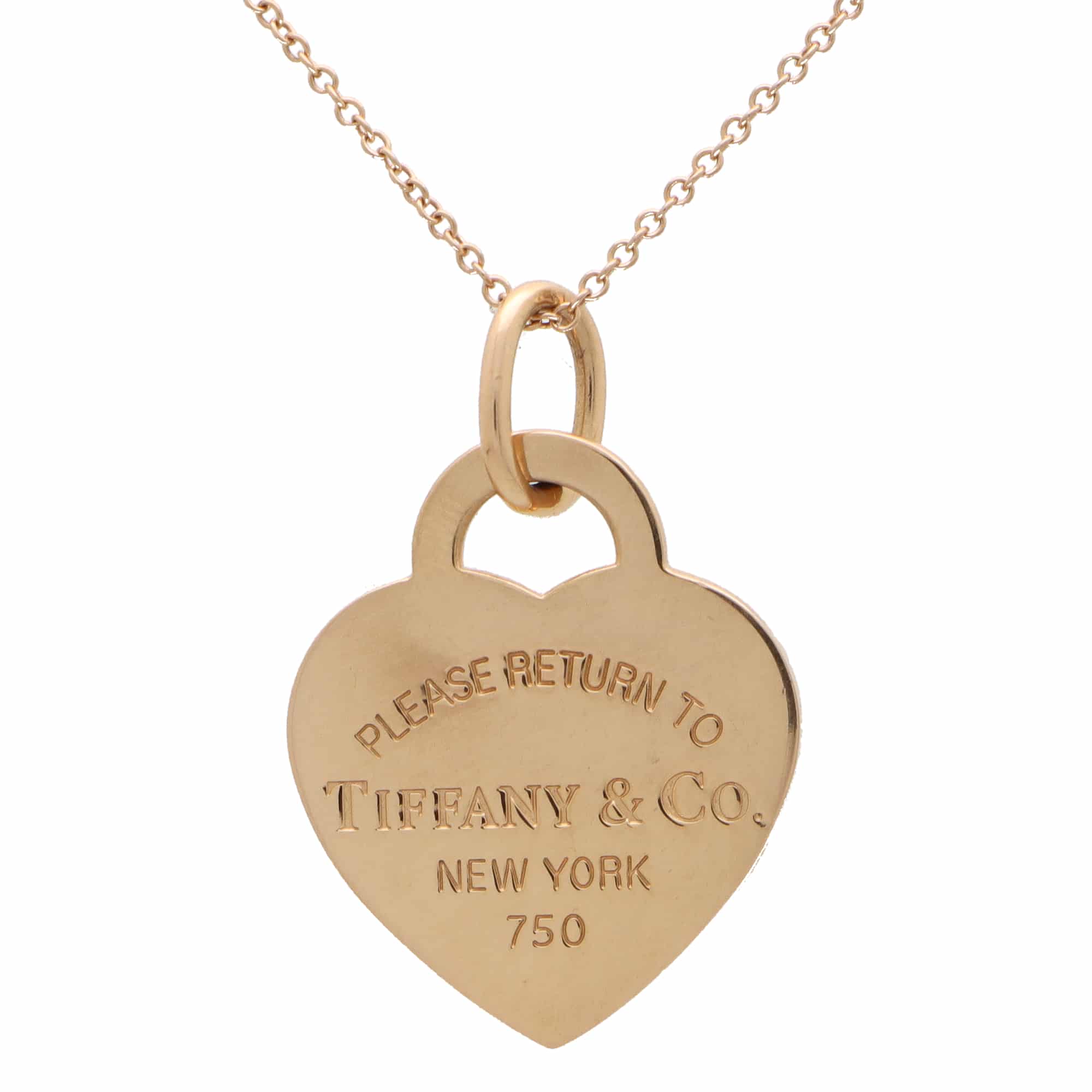 Elsa Peretti™ Open Heart pendant in 18k gold and turquoise. | Tiffany & Co.