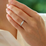 Contemporary Diamond Three Stone Ring With Diamond Shoulders