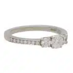 Contemporary Diamond Three Stone Ring With Diamond Shoulders