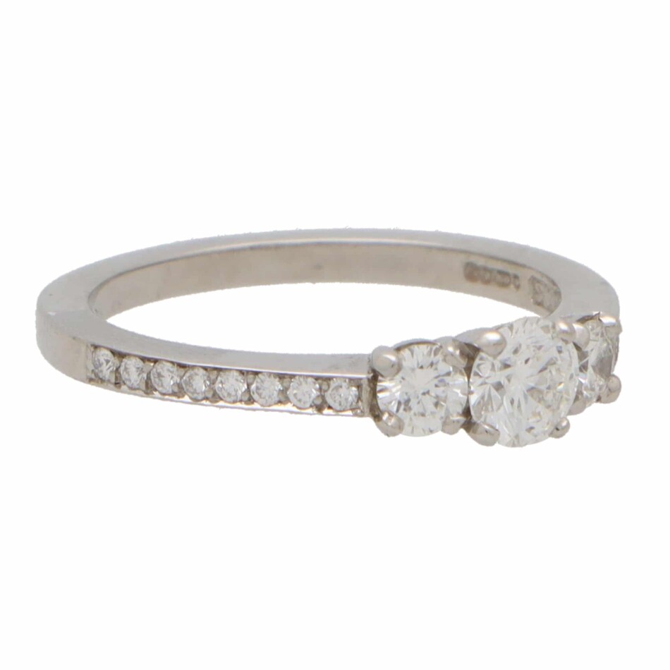 Contemporary Diamond Three Stone Ring With Diamond Shoulders