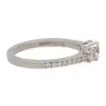 Contemporary Diamond Three Stone Ring With Diamond Shoulders