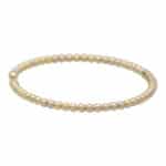 Contemporary Diamond Set Torque Bangle in Yellow Gold