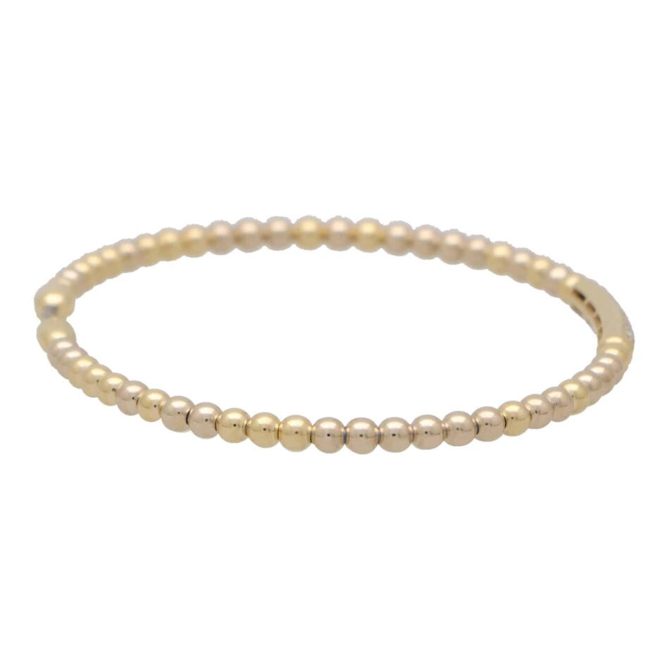 Contemporary Diamond Set Torque Bangle in Yellow Gold