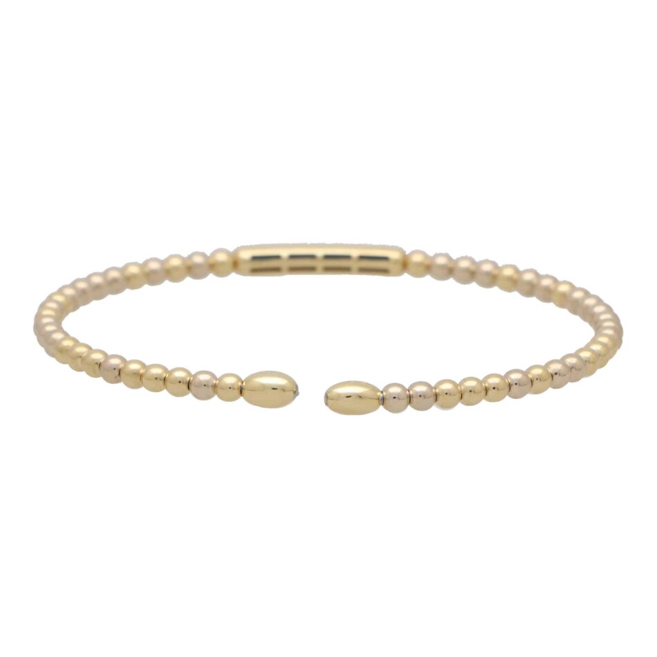 Contemporary Diamond Set Torque Bangle in Yellow Gold