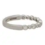 Contemporary Rub Over Set Diamond Half Eternity