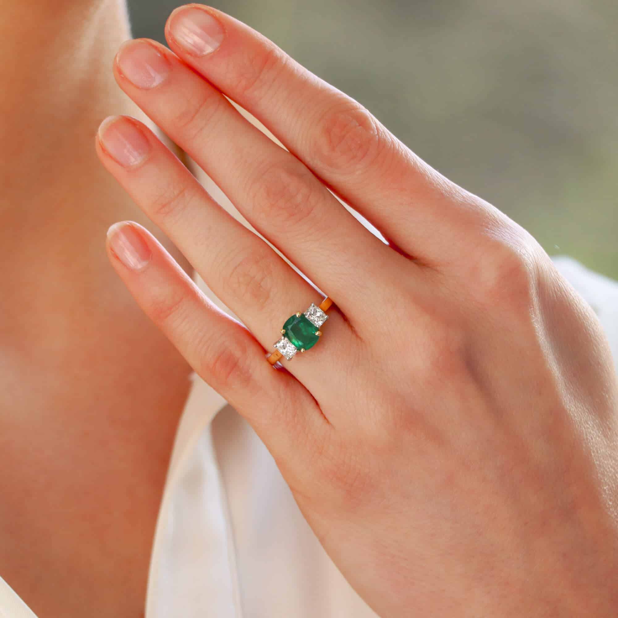 Contemporary Cushion Cut Emerald and Diamond Three Stone Ring at Susannah Lovis Jewellers