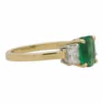 Contemporary Cushion Cut Emerald and Diamond Three Stone Ring