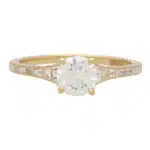 Art Deco Inspired Round Diamond Ring With Baguette Shoulders
