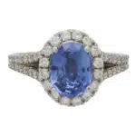 Vintage Blue Sapphire and Diamond Oval Halo Cluster Ring