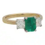Contemporary Emerald and Asscher Cut Diamond Three Stone Ring