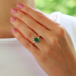 Contemporary Emerald and Pear Cut Diamond Three Stone Ring