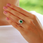 Contemporary Oval Emerald and Diamond Cluster Ring