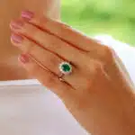 Contemporary Oval Emerald and Diamond Cluster Ring