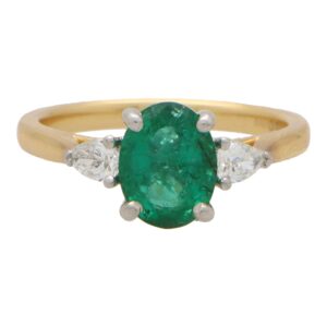 Contemporary Emerald and Pear Cut Diamond Three Stone Ring