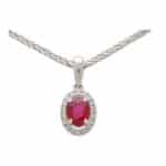 Ruby and Diamond Oval Halo Pendant Necklace