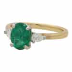 Contemporary Emerald and Pear Cut Diamond Three Stone Ring