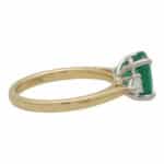 Contemporary Emerald and Pear Cut Diamond Three Stone Ring