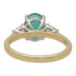 Contemporary Emerald and Pear Cut Diamond Three Stone Ring