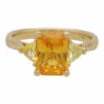 Elongated Orange Sapphire and Yellow Diamond Three Stone