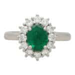 Contemporary Oval Emerald and Diamond Cluster Ring